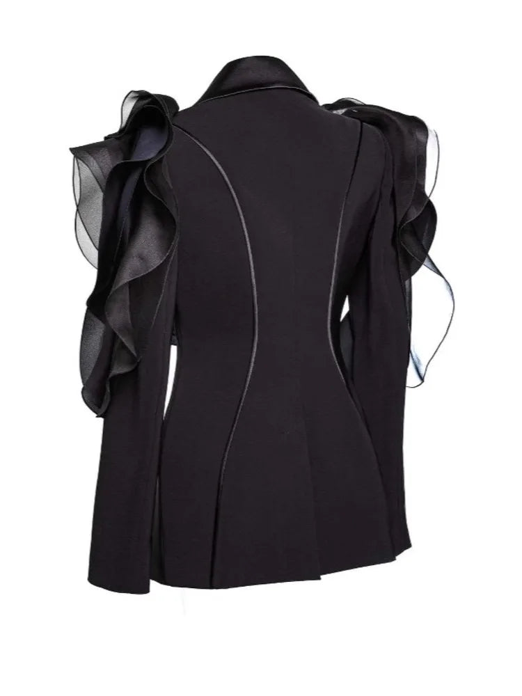 Black jacket with sheer ruffled sleeves